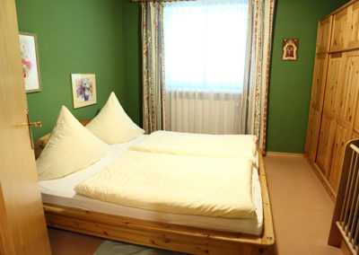 Schlafzimmer in der kleinen Ferienwohnung